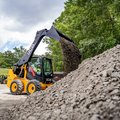 JCB 270 Skid Steer Loader dumping dirt