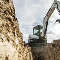 Bobcat E55 Mini Excavator trenching