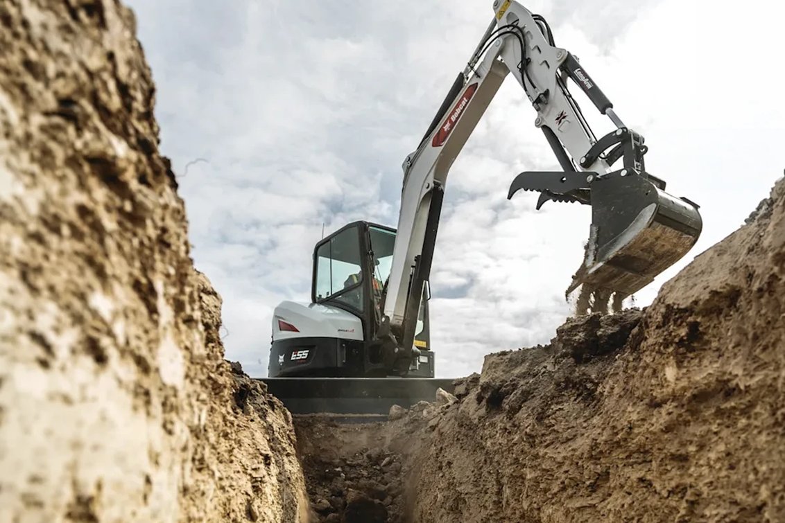 Bobcat E55 Mini Excavator trenching