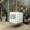 JCB 270T Compact Track Loader hauling water supplies industrial setting