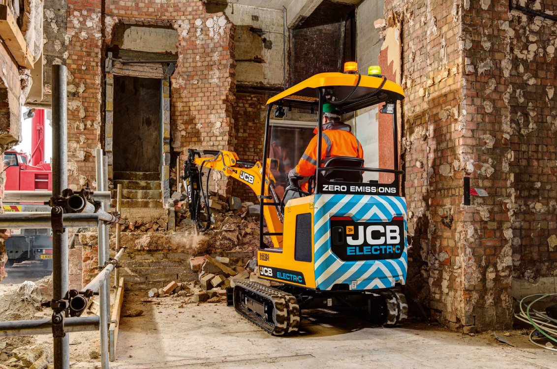 JCB 19C-1E Electric Mini Excavator breaking rocks in a confined space