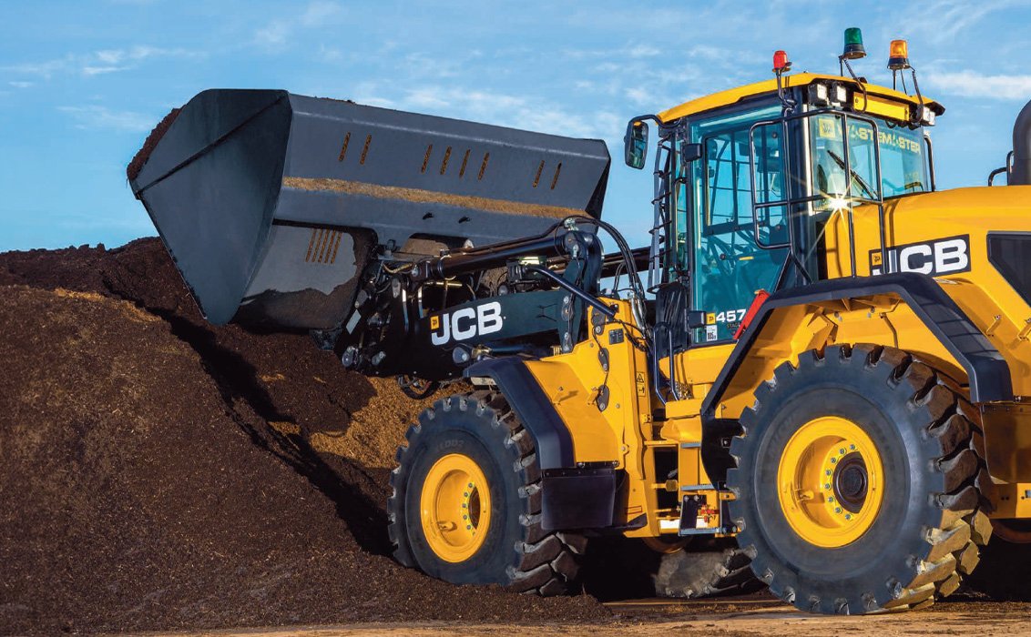 JCB 457 Wheel Loader loading a large load of soil
