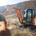 DEVELON DX27Z-7 Mini Excavator digging dirt