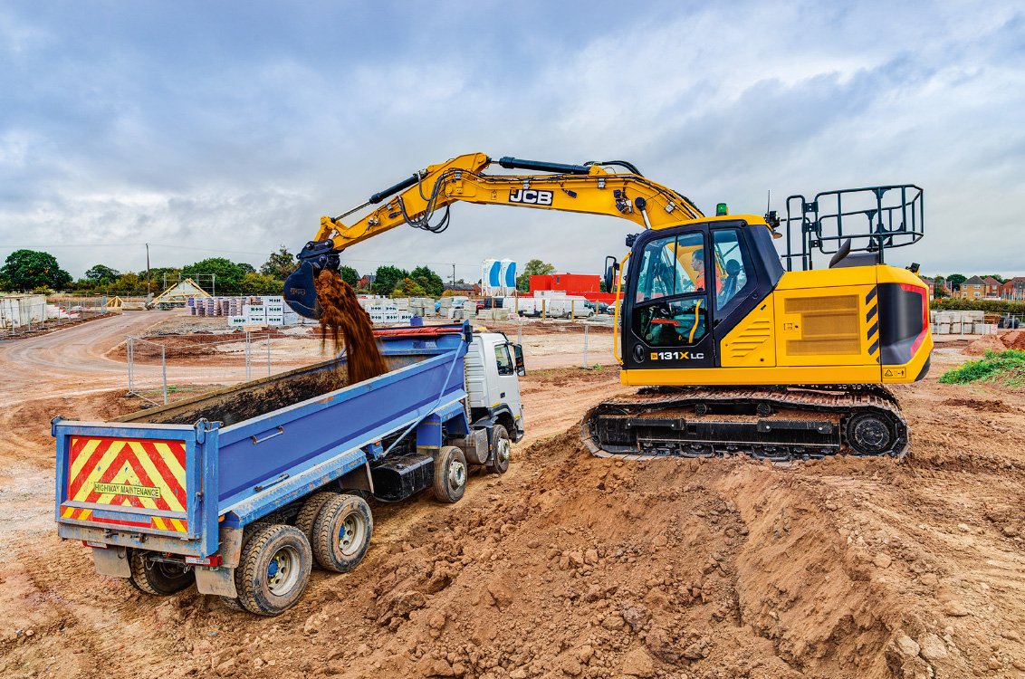 JCB 131X Crawler Excavator loading a dump truck