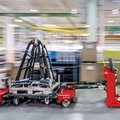 Linde P-MATIC Automated Tow Tractor in warehouse