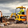 JCB 18Z-1 Mini Excavator moving earth in a tight space