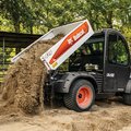 Bobcat UW56 Toolcat dumping dirt