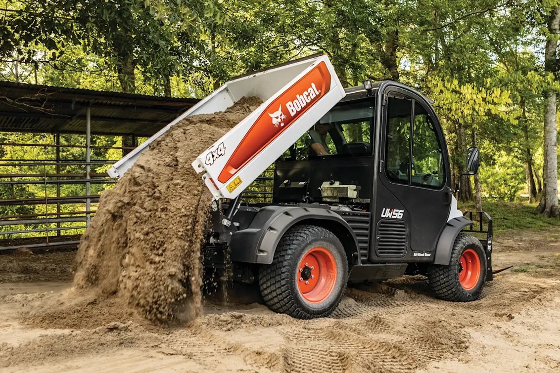 Bobcat UW56 Toolcat dumping dirt