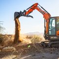 DEVELON DX50Z-7 Mini Excavator digging a trench