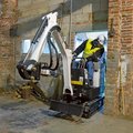Bobcat E10 Mini Excavator in a narrow construction doorway