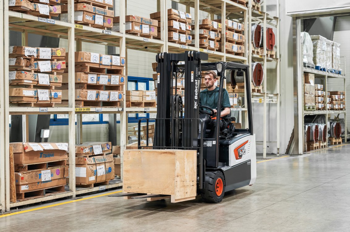 Bobcat B18T-7 Plus 3-Wheel Electric Cushion Forklift in a warehouse