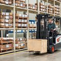 Bobcat B18T-7 Plus 3-Wheel Electric Cushion Forklift in a warehouse