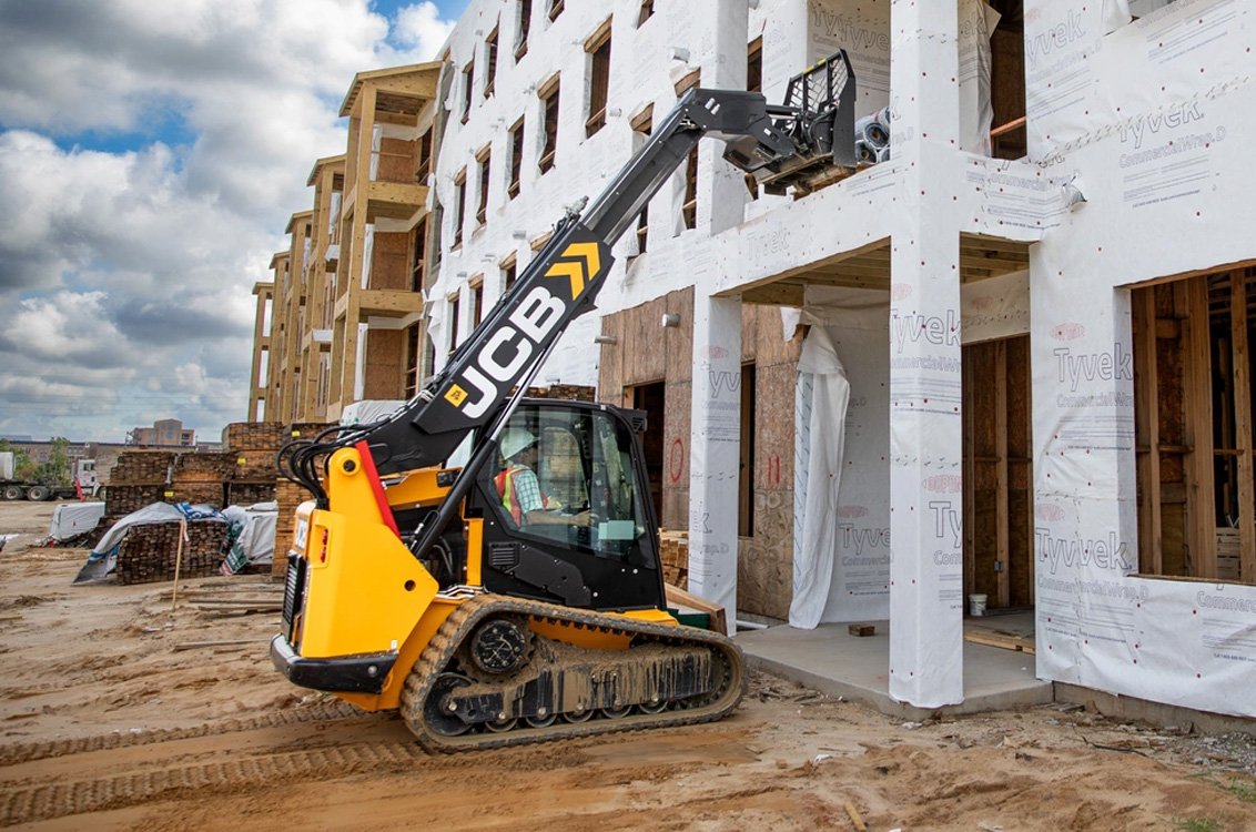 JCB 3TS-8T Teleskid Compact Track Loader lifting construction supplies