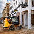 JCB 3TS-8T Teleskid Compact Track Loader lifting construction supplies