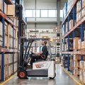 Bobcat B20T-7 Plus 3-Wheel Electric Cushion Forklift in a warehouse