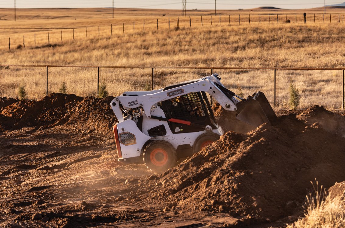 Bobcat S770 Skid Steer loader working on the farm