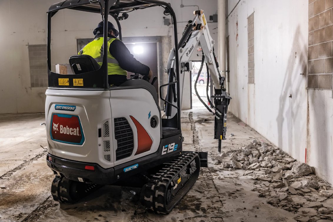 Bobcat E19e Electric Mini Excavator breaking cement floor