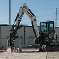 Bobcat E55 Mini Excavator drilling