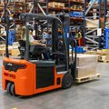 Linde E20 Cushion Electric Rider Forklift in warehouse