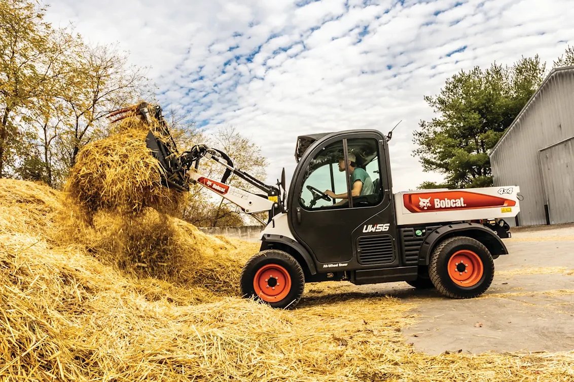 Bobcat UW56 Toolcat gathering straw