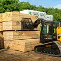 JCB 4TS-8T Teleskid Compact Track Loader stacking lumber