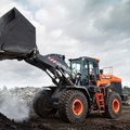 DEVELON DL320-7 Wheel Loader dumping a load of dirt