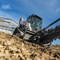 Bobcat T86 Compact Track Loader with trencher attachment