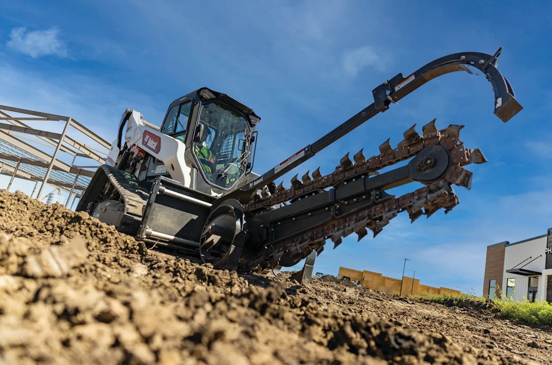 Bobcat T86 Compact Track Loader with trencher attachment