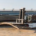 Bobcat DV180S-7 IC Pneumatic Forklift hauling a large quantity of fencing