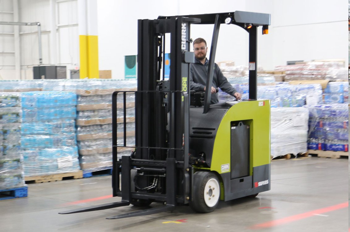 Clark SE15T 3-Wheel Electric Forklift in a bottling plant warehouse