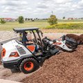 Bobcat L65 Compact Wheel Loader loading mulch