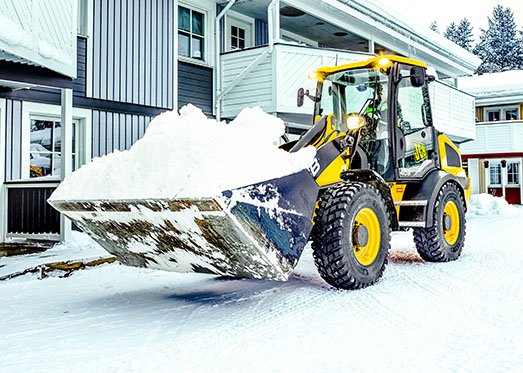 JCB 409 Wheel Loader clearing snow