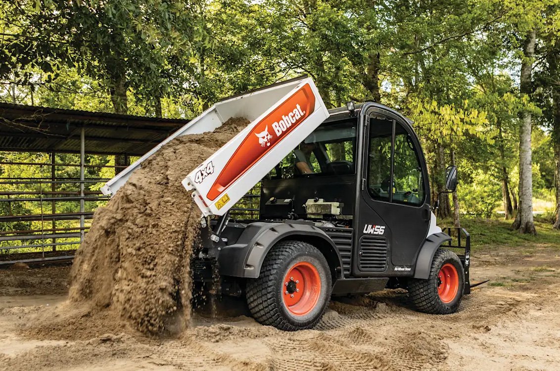 Bobcat UW56 Toolcat Utility Work Machine dumping dirt