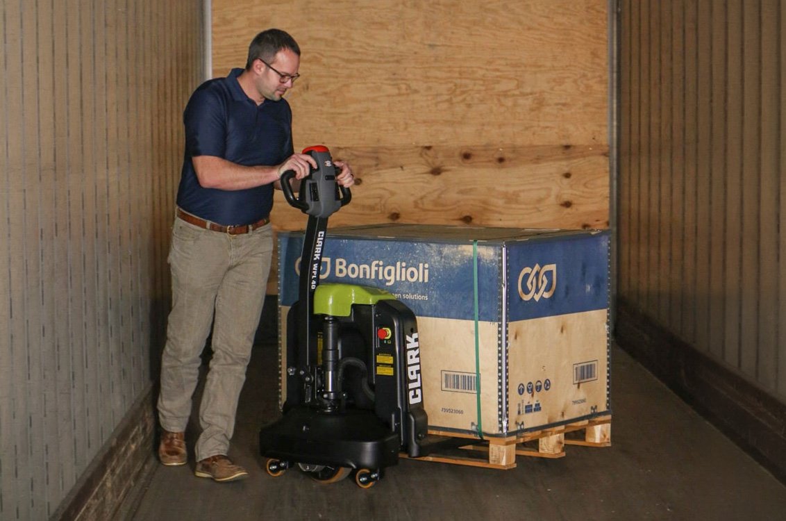 CLARK electric pallet jack inside semi trailer