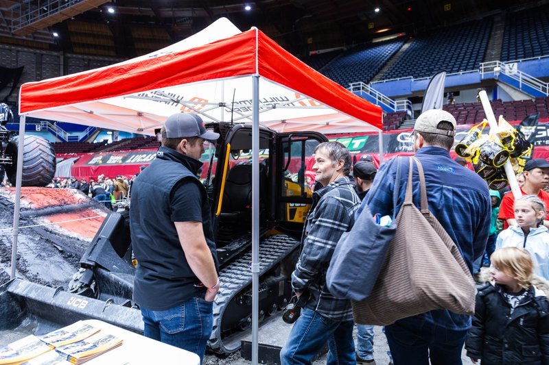 Williams Machinery team members talk to customers and fans at Monster Jam, Vancouver