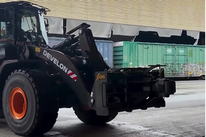 How A Rail Knuckle Attachment Can Turn Your Wheel Loader into a Rail Car Transporter